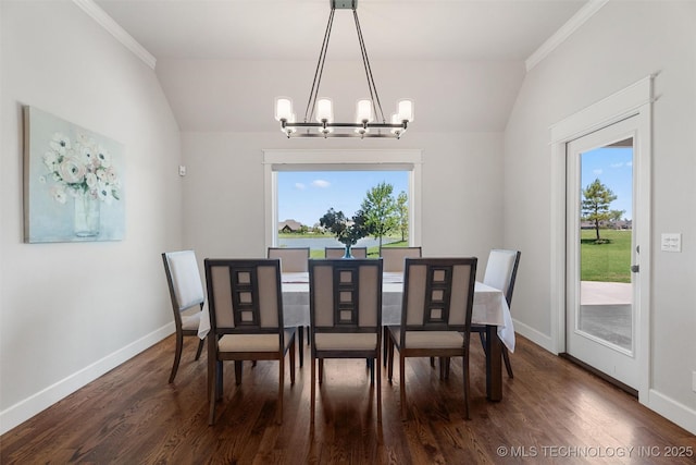 8209 N 150th Ave E, Owasso, OK 74055 - dining space featuring a chandelier, vaulted ceiling, baseboards, ornamental molding, and dark wood finished floors