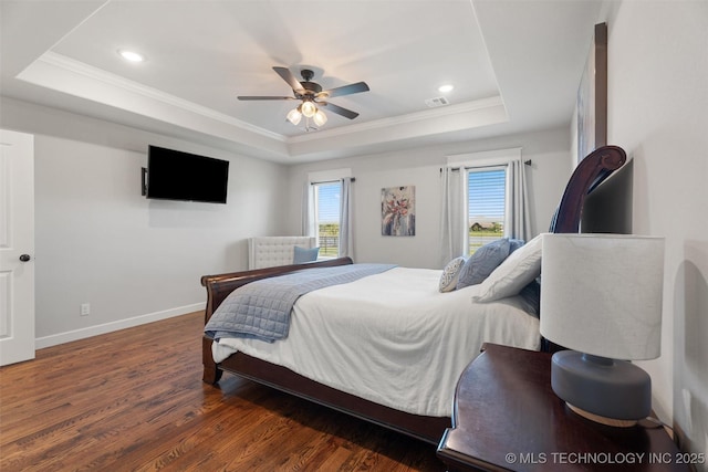 8209 N 150th Ave E, Owasso, OK 74055 - bedroom with a tray ceiling, ornamental molding, multiple windows, baseboards, and wood finished floors
