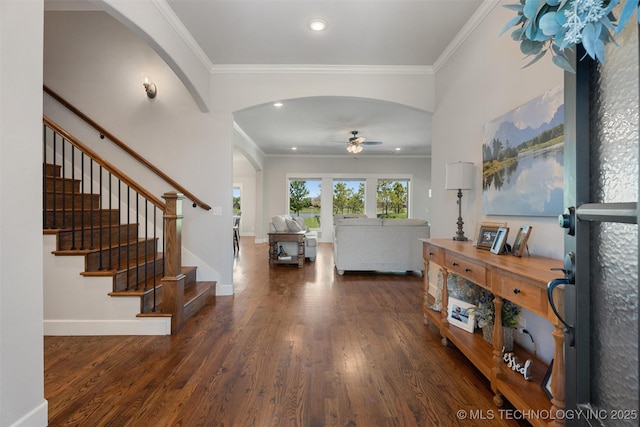 8209 N 150th Ave E, Owasso, OK 74055 - foyer featuring ceiling fan, arched walkways, wood finished floors, ornamental molding, and stairs