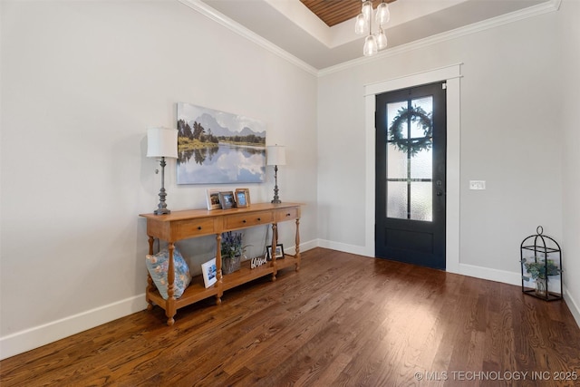 8209 N 150th Ave E, Owasso, OK 74055 - foyer entrance featuring baseboards, wood finished floors, a raised ceiling, and crown molding