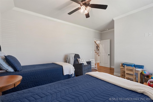 8209 N 150th Ave E, Owasso, OK 74055 - bedroom featuring ornamental molding, baseboards, wood finished floors, and a ceiling fan
