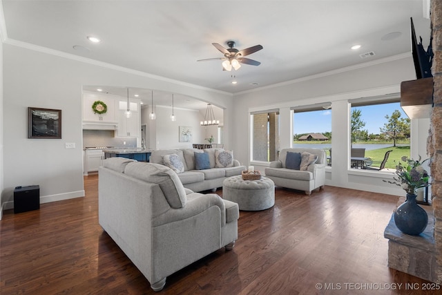 8209 N 150th Ave E, Owasso, OK 74055 - living room with ceiling fan, recessed lighting, dark wood-type flooring, crown molding, and baseboards