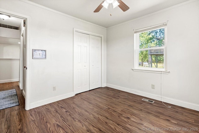 18094 S 461st E Ave, Porter, OK 74454 - unfurnished bedroom featuring crown molding, wood finished floors, baseboards, and a closet