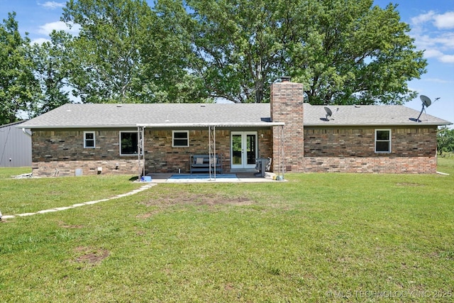 18094 S 461st E Ave, Porter, OK 74454 - back of property featuring french doors, a chimney, brick siding, and a patio area