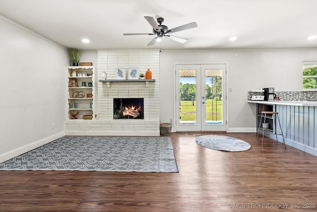 18094 S 461st E Ave, Porter, OK 74454 - living area featuring baseboards, wood finished floors, a ceiling fan, recessed lighting, and a brick fireplace