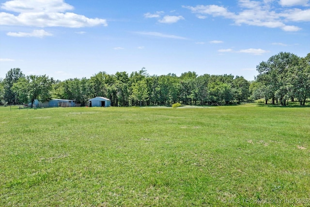 18094 S 461st E Ave, Porter, OK 74454 - view of grassy yard with an outbuilding, a rural view, and a pole building