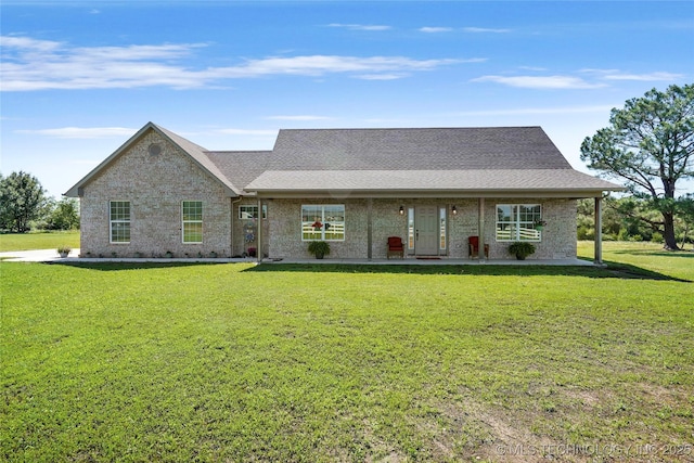 8323 S 2nd W, Muskogee, OK 74401 - view of front facade with a front lawn, brick siding, and a shingled roof