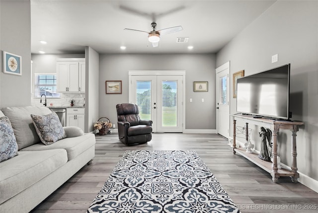 8323 S 2nd W, Muskogee, OK 74401 - living area featuring ceiling fan, recessed lighting, light wood-style floors, baseboards, and french doors