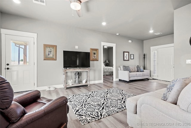 8323 S 2nd W, Muskogee, OK 74401 - living room featuring a ceiling fan, recessed lighting, wood finished floors, and baseboards