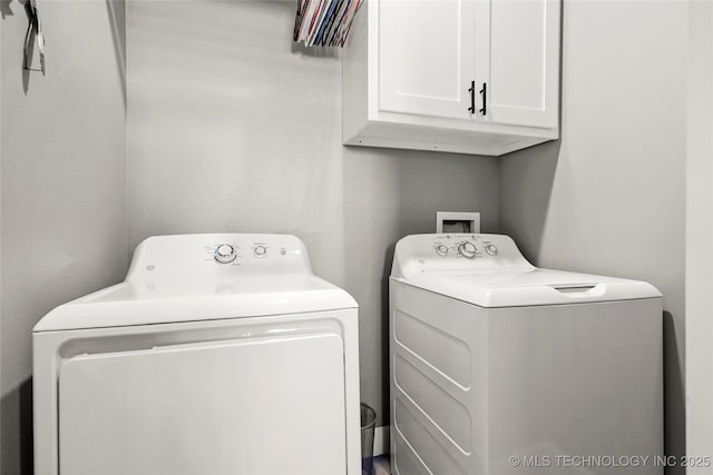 8323 S 2nd W, Muskogee, OK 74401 - washroom with cabinet space and washer and dryer