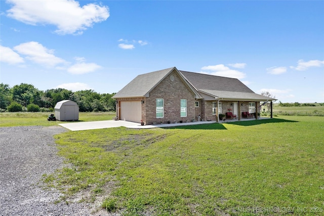8315 S 2nd W, Muskogee, OK 74401 - view of front of house featuring concrete driveway, a garage, brick siding, a front lawn, and a porch
