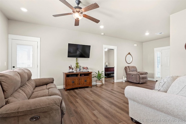 8315 S 2nd W, Muskogee, OK 74401 - living area with a ceiling fan, wood finished floors, baseboards, plenty of natural light, and recessed lighting