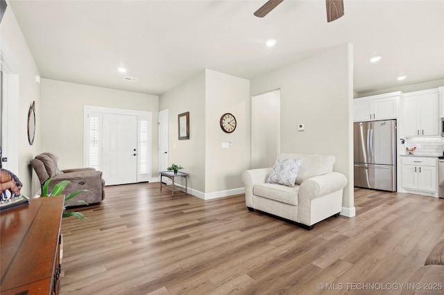 8315 S 2nd W, Muskogee, OK 74401 - living area featuring light wood-style floors, ceiling fan, recessed lighting, and baseboards