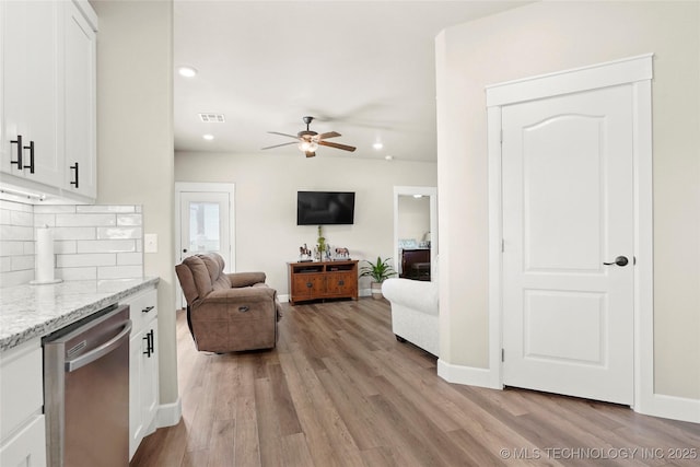 8315 S 2nd W, Muskogee, OK 74401 - living room featuring ceiling fan, light wood-style floors, recessed lighting, and baseboards