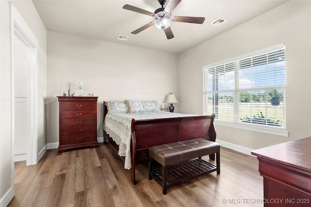 8315 S 2nd W, Muskogee, OK 74401 - bedroom with baseboards, light wood-style flooring, and ceiling fan