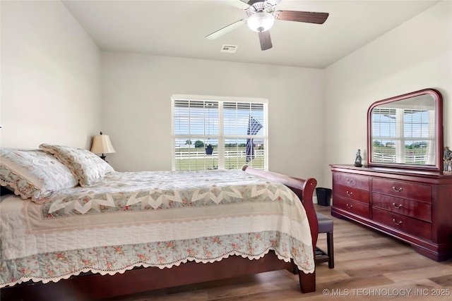 8315 S 2nd W, Muskogee, OK 74401 - bedroom featuring wood finished floors and a ceiling fan