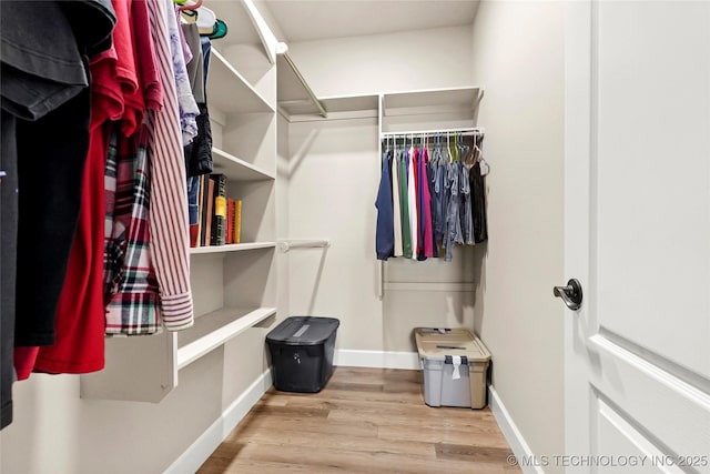 8315 S 2nd W, Muskogee, OK 74401 - walk in closet with wood finished floors