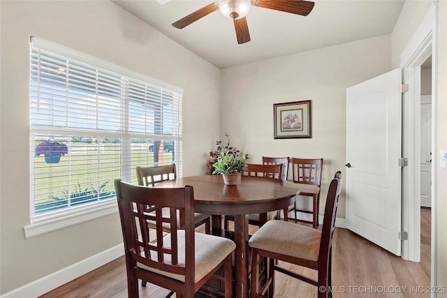 8315 S 2nd W, Muskogee, OK 74401 - dining area featuring a ceiling fan, light wood-style flooring, and baseboards