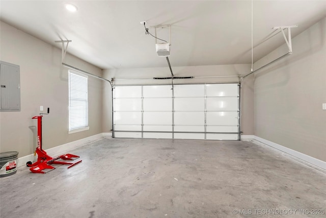 8315 S 2nd W, Muskogee, OK 74401 - garage featuring electric panel, baseboards, and a garage door opener