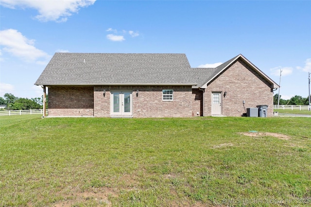 8315 S 2nd W, Muskogee, OK 74401 - rear view of property with french doors, cooling unit, brick siding, and a shingled roof