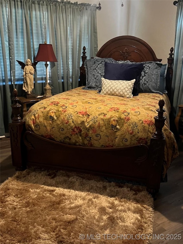 417 S 16th Ave, Durant, OK 74701 - bedroom with wood finished floors