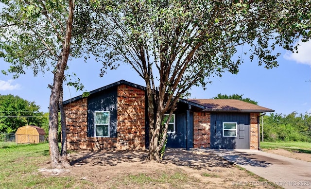 401 E 25th St, Okmulgee, OK 74447 - view of front of property with brick siding