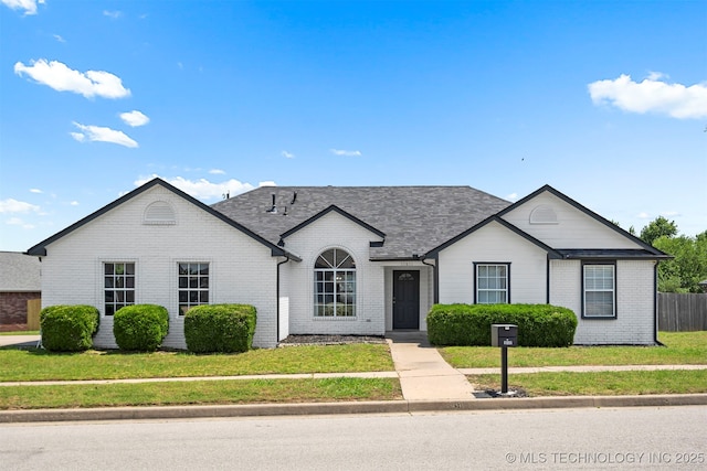 11811 N 109th Ave E, Collinsville, OK 74021 - view of front of home with brick siding and roof with shingles