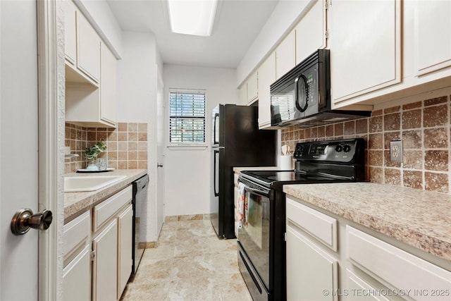 6374 S 80th E Ave Unit A, Tulsa, OK 74133 - kitchen with black appliances, light countertops, baseboards, and tasteful backsplash