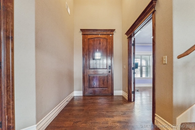 9512 N 144th E Ave, Owasso, OK 74055 - entryway featuring dark wood-type flooring and baseboards