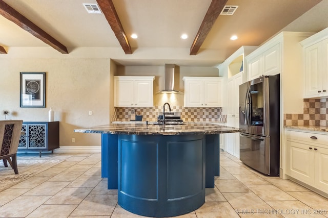 9512 N 144th E Ave, Owasso, OK 74055 - kitchen featuring stainless steel refrigerator with ice dispenser, wall chimney exhaust hood, dark stone countertops, beamed ceiling, and light tile patterned floors