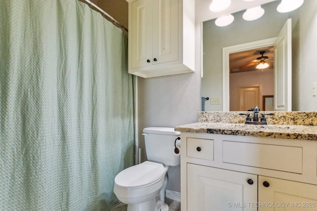 9512 N 144th E Ave, Owasso, OK 74055 - bathroom with toilet, vanity, a shower with curtain, and a ceiling fan