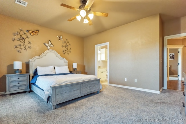9512 N 144th E Ave, Owasso, OK 74055 - carpeted bedroom with baseboards, ensuite bath, and a ceiling fan