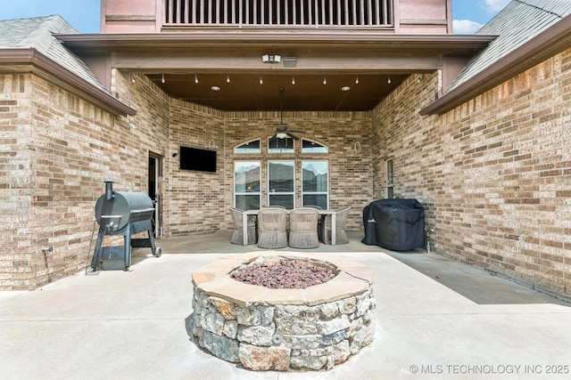 9512 N 144th E Ave, Owasso, OK 74055 - view of patio with an outdoor fire pit, grilling area, a balcony, and ceiling fan