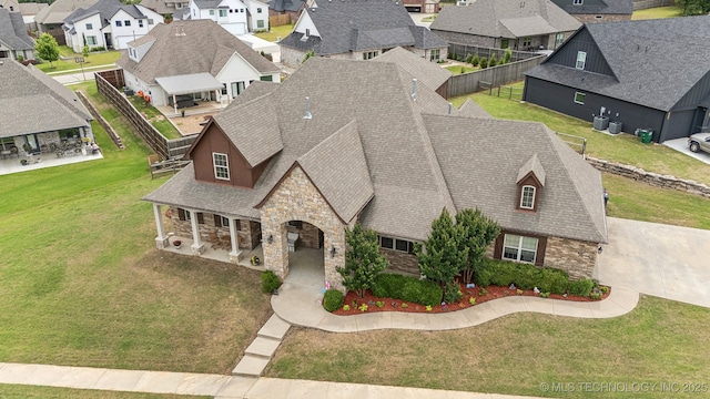 9512 N 144th E Ave, Owasso, OK 74055 - aerial perspective of suburban area