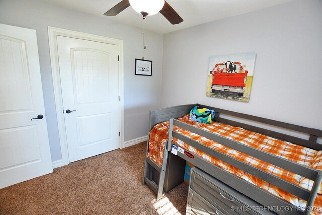 2570 Ambers Way, Tahlequah, OK 74464 - bedroom featuring light carpet, a ceiling fan, and baseboards