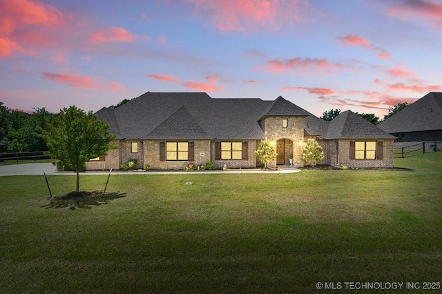 10406 N 86th E Ave, Owasso, OK 74055 - french country home with brick siding and stone siding