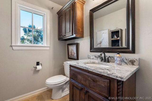 10406 N 86th E Ave, Owasso, OK 74055 - bathroom with vanity, baseboards, and toilet