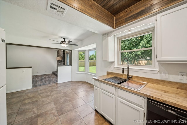 8208 N 122nd E Ave, Owasso, OK 74055 - kitchen with wooden counters, a sink, wood ceiling, dishwasher, and white cabinets
