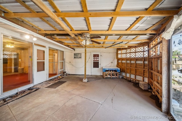 4921 E 26th St, Tulsa, OK 74114 - garage featuring a ceiling fan