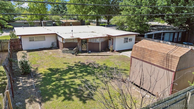 4921 E 26th St, Tulsa, OK 74114 - view of yard featuring an outbuilding