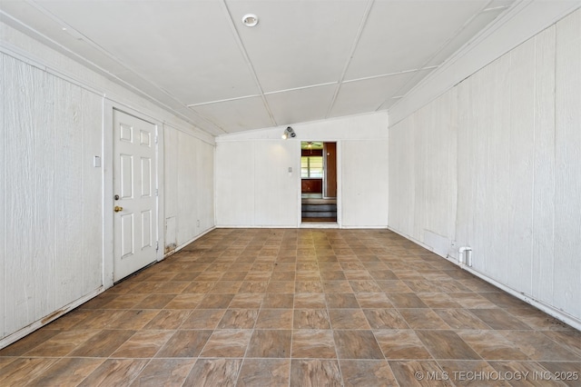 1604 E 55th Pl, Tulsa, OK 74105 - unfurnished room with wood walls