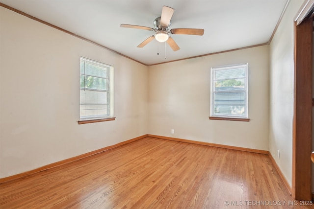1604 E 55th Pl, Tulsa, OK 74105 - spare room featuring light wood-style floors, crown molding, baseboards, and a ceiling fan
