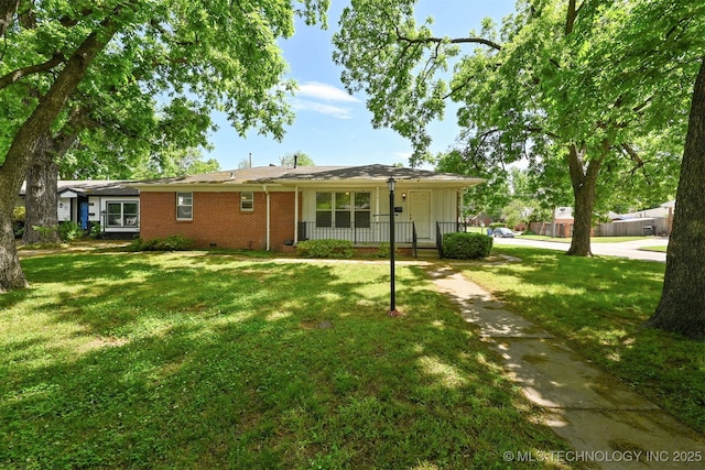 1604 E 55th Pl, Tulsa, OK 74105 - view of front of home featuring covered porch, a front lawn, and brick siding