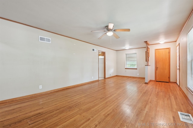 1604 E 55th Pl, Tulsa, OK 74105 - empty room with ceiling fan, light wood-type flooring, and baseboards