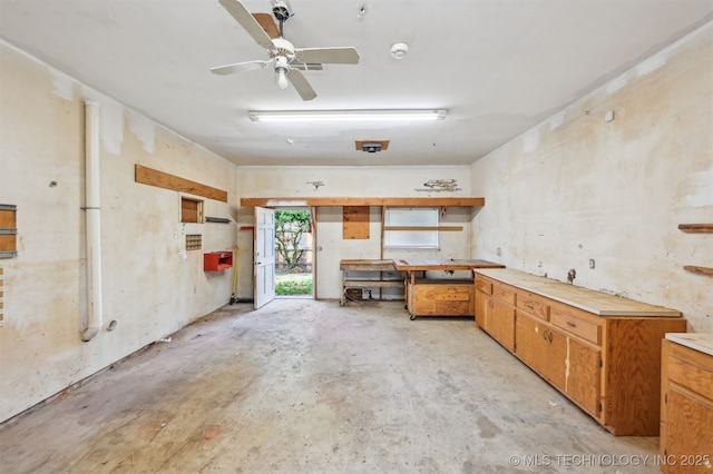 1604 E 55th Pl, Tulsa, OK 74105 - garage featuring a workshop area and ceiling fan