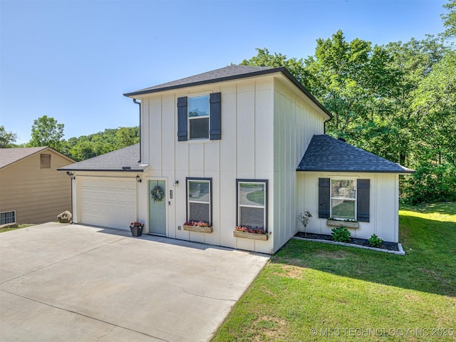 228 W Ohio Ave, Kiefer, OK 74041 - view of front of property featuring roof with shingles, a garage, board and batten siding, a front yard, and driveway