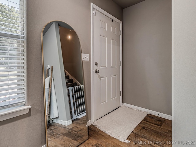 228 W Ohio Ave, Kiefer, OK 74041 - entryway featuring wood finished floors, plenty of natural light, and baseboards