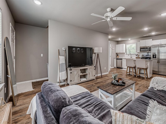 228 W Ohio Ave, Kiefer, OK 74041 - living area featuring baseboards, recessed lighting, a ceiling fan, and wood finished floors