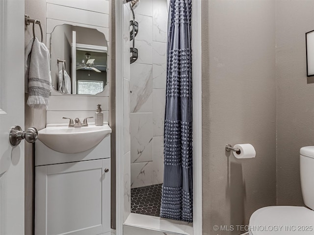 228 W Ohio Ave, Kiefer, OK 74041 - full bath featuring toilet, a stall shower, vanity, and ceiling fan