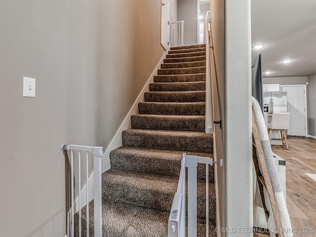 228 W Ohio Ave, Kiefer, OK 74041 - stairway featuring wood finished floors and recessed lighting